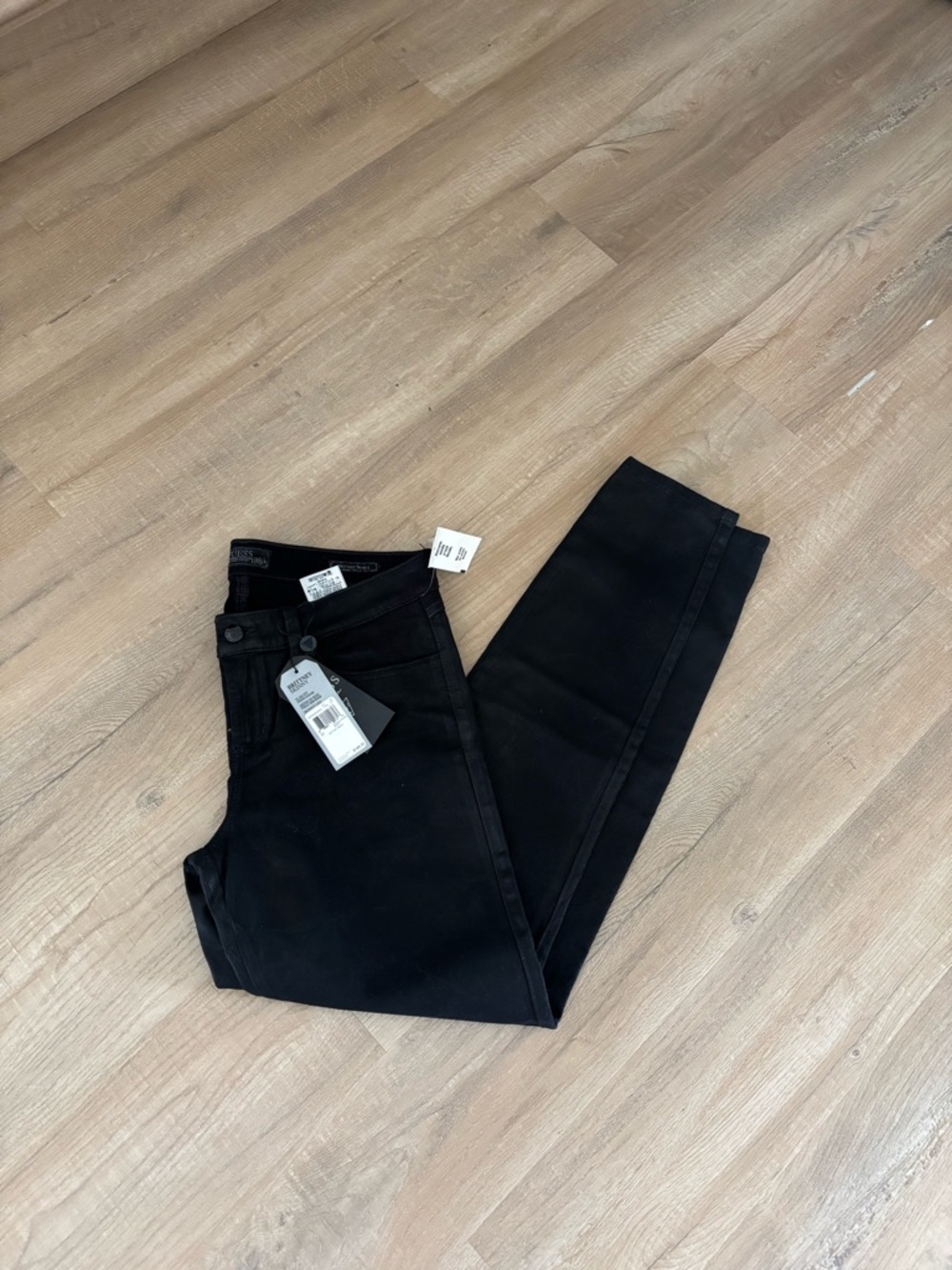 GUESS Brittney Skinny Jeans in the color Crinkle Coated Black